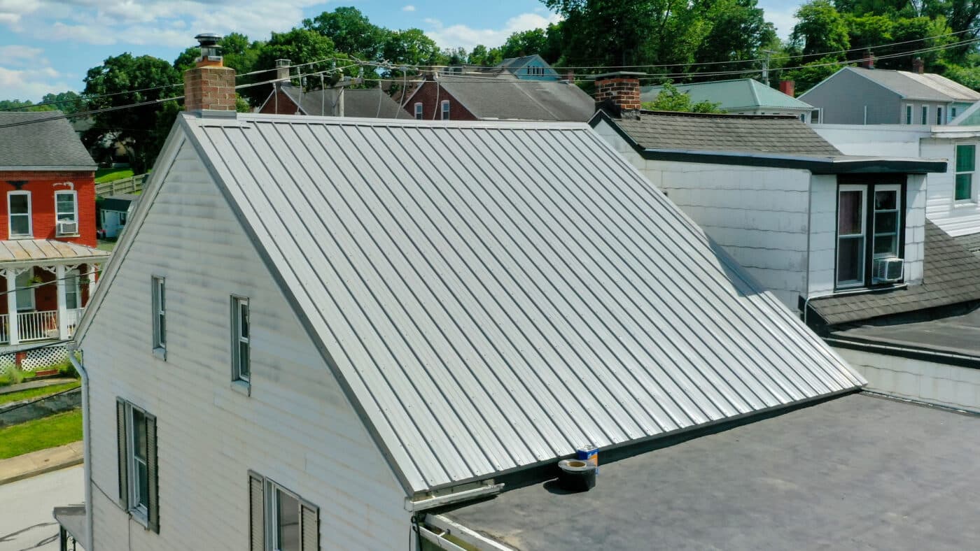Finished gray metal roof installed on a house