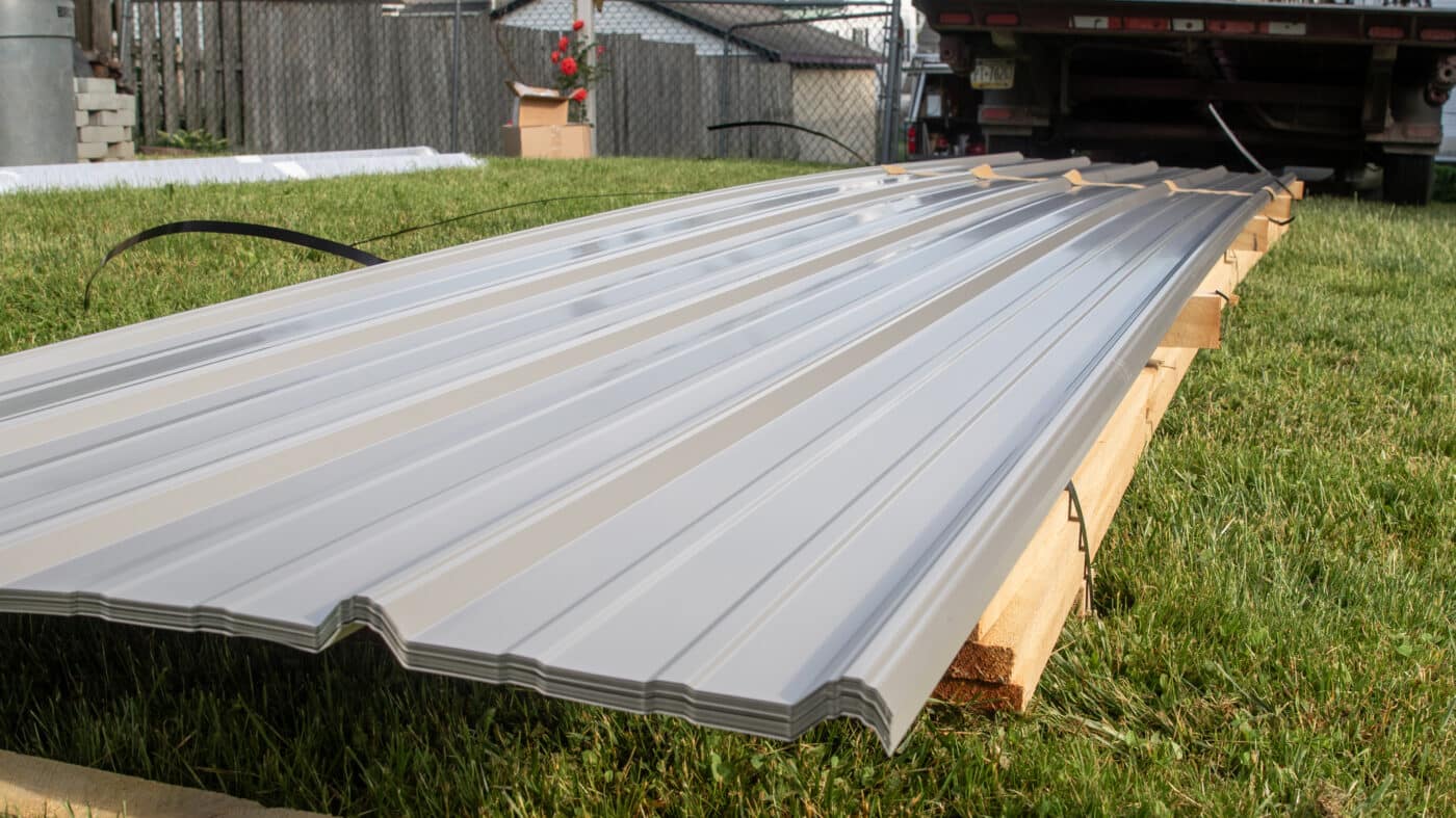 Metal panels cut to size ready for installation on a roof