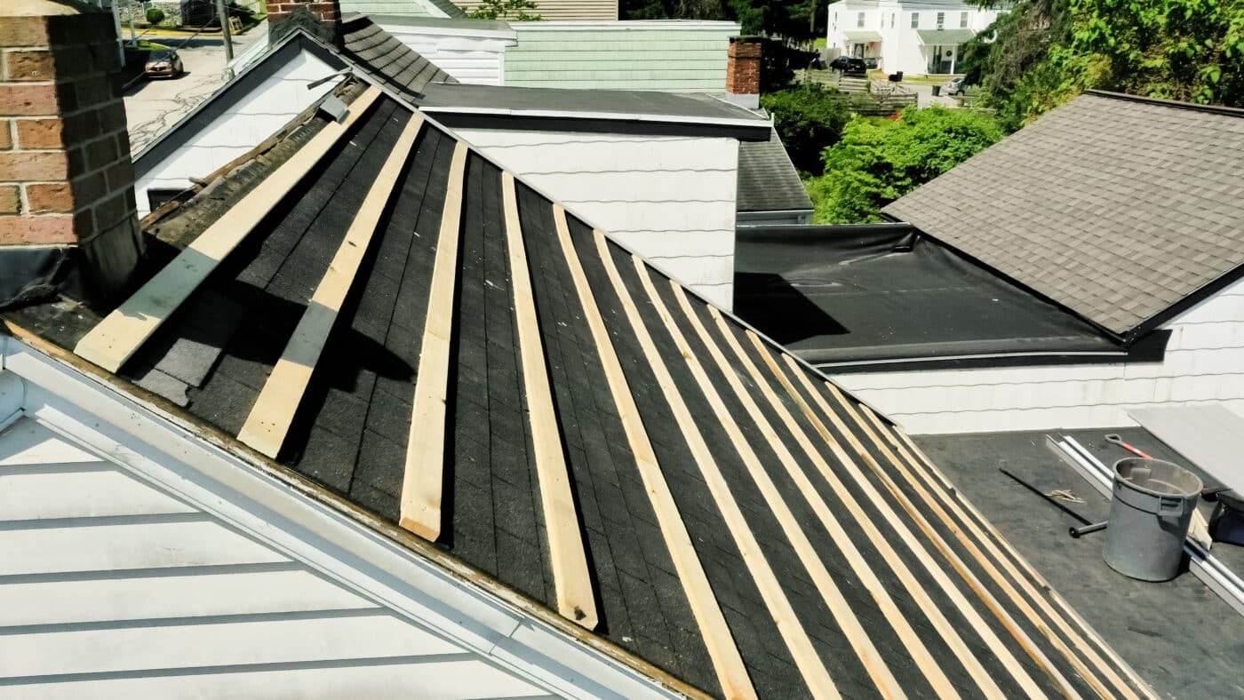 Roof prepared for metal panels to be installed